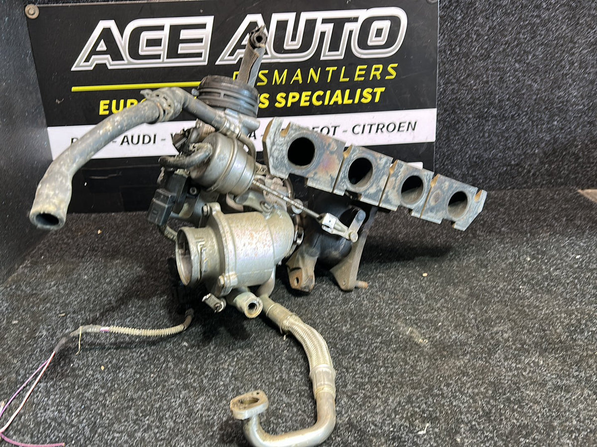 2008 Volkswagen Eos - Turbo Exhaust Manifold PN: 06F 145 701 H Exhaust manifold with turbo- charge