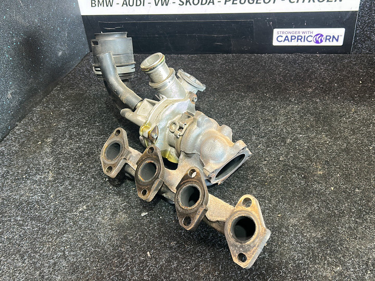 2010 Volkswagen Polo - Turbo Exhaust Manifold PN: 03F 145 701 T Exhaust manifold with turbo- charger