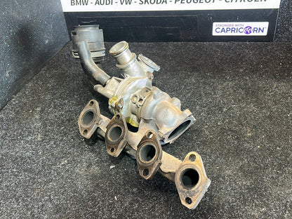 2010 Volkswagen Polo - Turbo Exhaust Manifold PN: 03F 145 701 T Exhaust manifold with turbo- charger