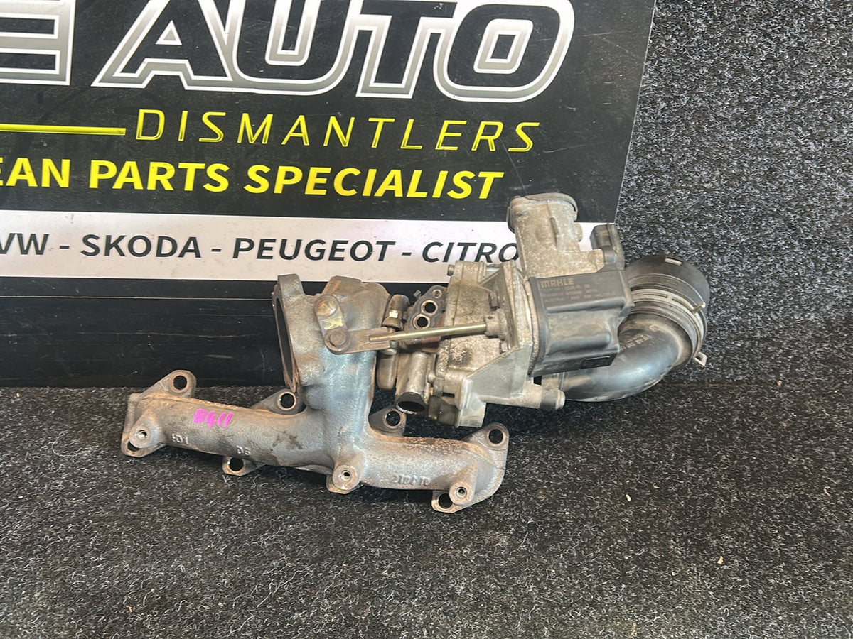 2010 Volkswagen Polo - Turbo Exhaust Manifold PN: 03F 145 701 T Exhaust manifold with turbo- charger