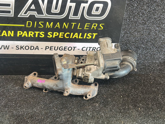 2010 Volkswagen Polo - Turbo Exhaust Manifold PN: 03F 145 701 T Exhaust manifold with turbo- charger