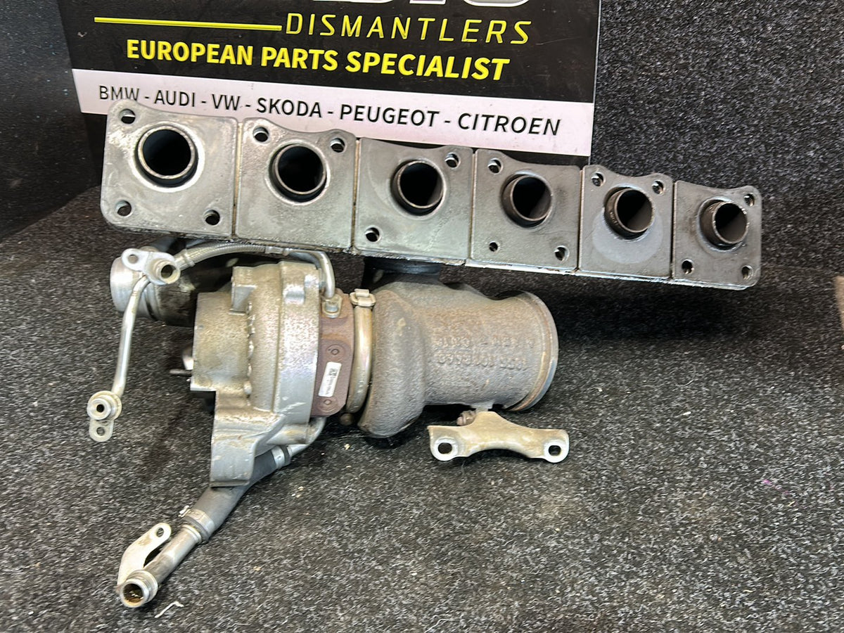 2010 BMW 135i E82 - Turbo Exhaust Manifold PN: 11 65 7 588 995 RP Exhaust turbocharger w/exh.manifold