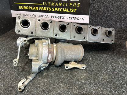 2010 BMW 135i E82 - Turbo Exhaust Manifold PN: 11 65 7 588 995 RP Exhaust turbocharger w/exh.manifold