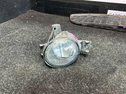 2011 BMW X1- Left Spotlight