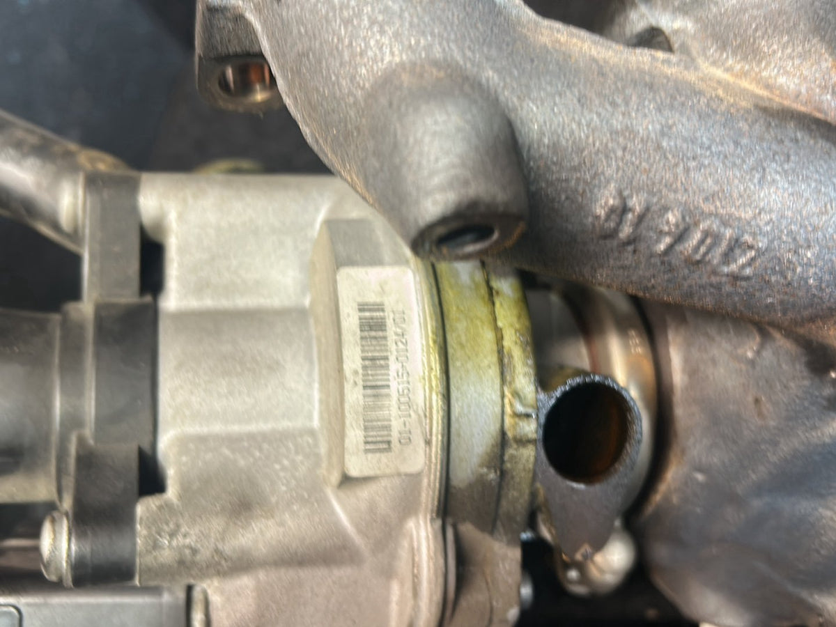 2010 Volkswagen Polo - Turbo Exhaust Manifold PN: 03F 145 701 T Exhaust manifold with turbo- charger