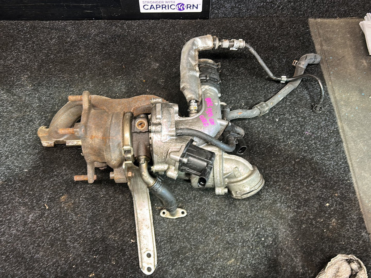 2009 Volkswagen Golf MK6 - Turbo Exhaust Manifold PN: 06J 145 713 T Exhaust manifold with turbo- charger