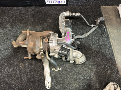 2009 Volkswagen Golf MK6 - Turbo Exhaust Manifold PN: 06J 145 713 T Exhaust manifold with turbo- charger