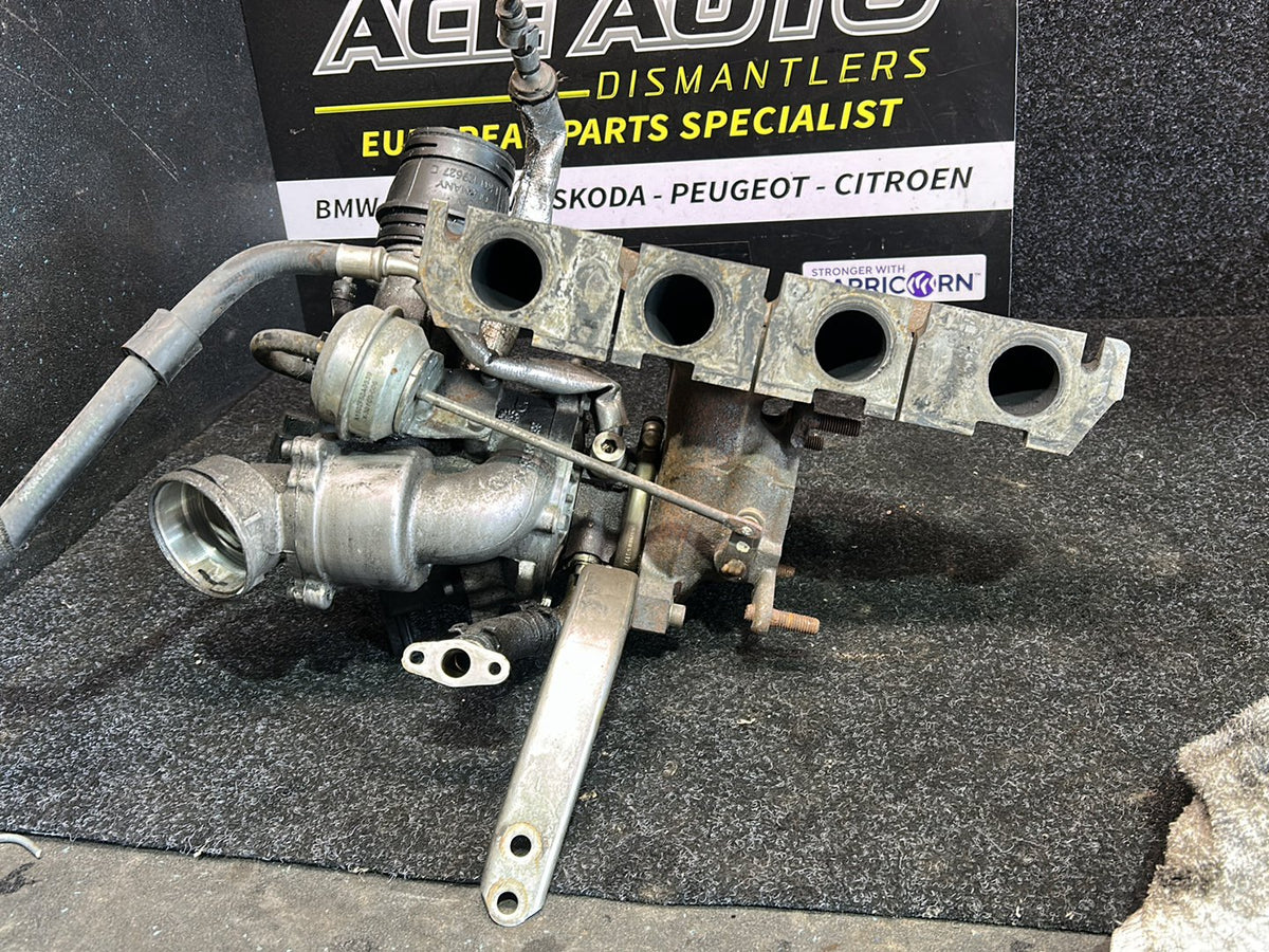2009 Volkswagen Golf MK6 - Turbo Exhaust Manifold PN: 06J 145 713 T Exhaust manifold with turbo- charger