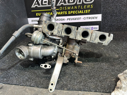 2009 Volkswagen Golf MK6 - Turbo Exhaust Manifold PN: 06J 145 713 T Exhaust manifold with turbo- charger